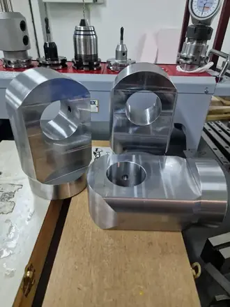Pair of milled aluminium housings